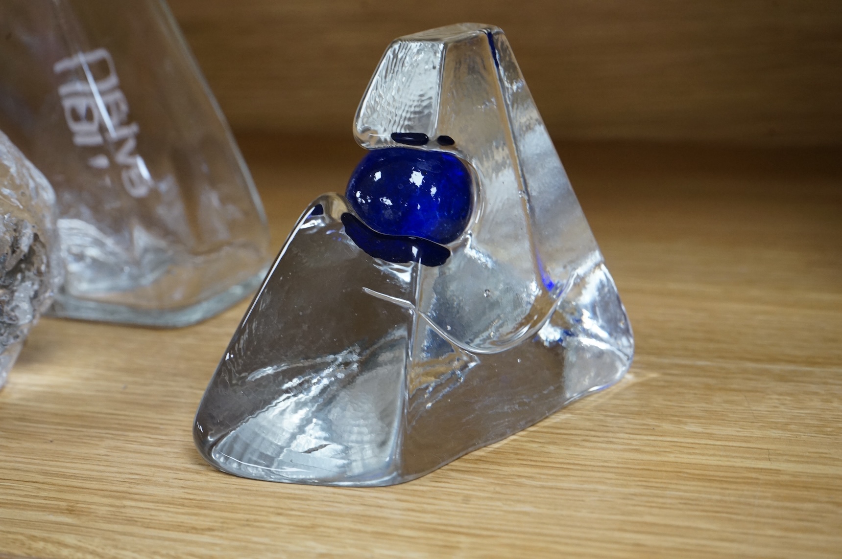 A collection of glassware including a Kosta Boda snowball pot and an Evian advertising water bottle, largest 23cm high